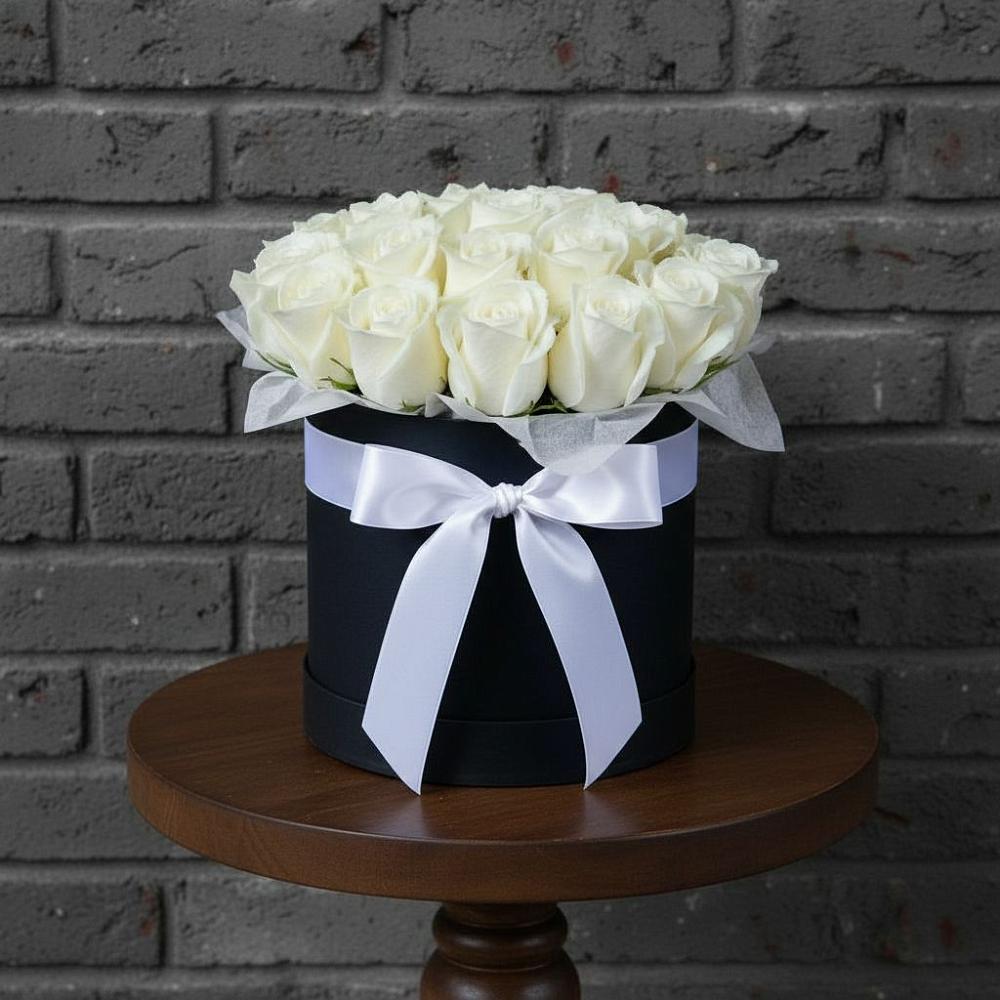 Цветочная композиция из Розы в шляпной коробке в Оренбург